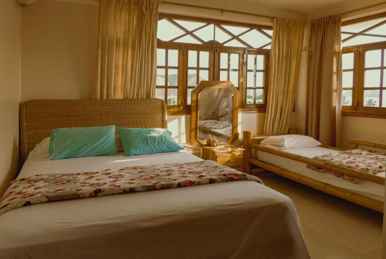 Hostal Poseidon بويرتو كايو المظهر الخارجي الصورة