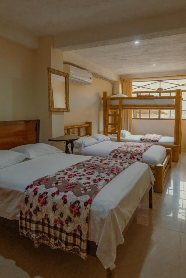 Hostal Poseidon بويرتو كايو المظهر الخارجي الصورة